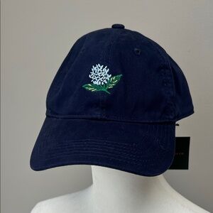 Navy blue cloth baseball style hat with hydrangea detail. NWT Rifle Paper Co.